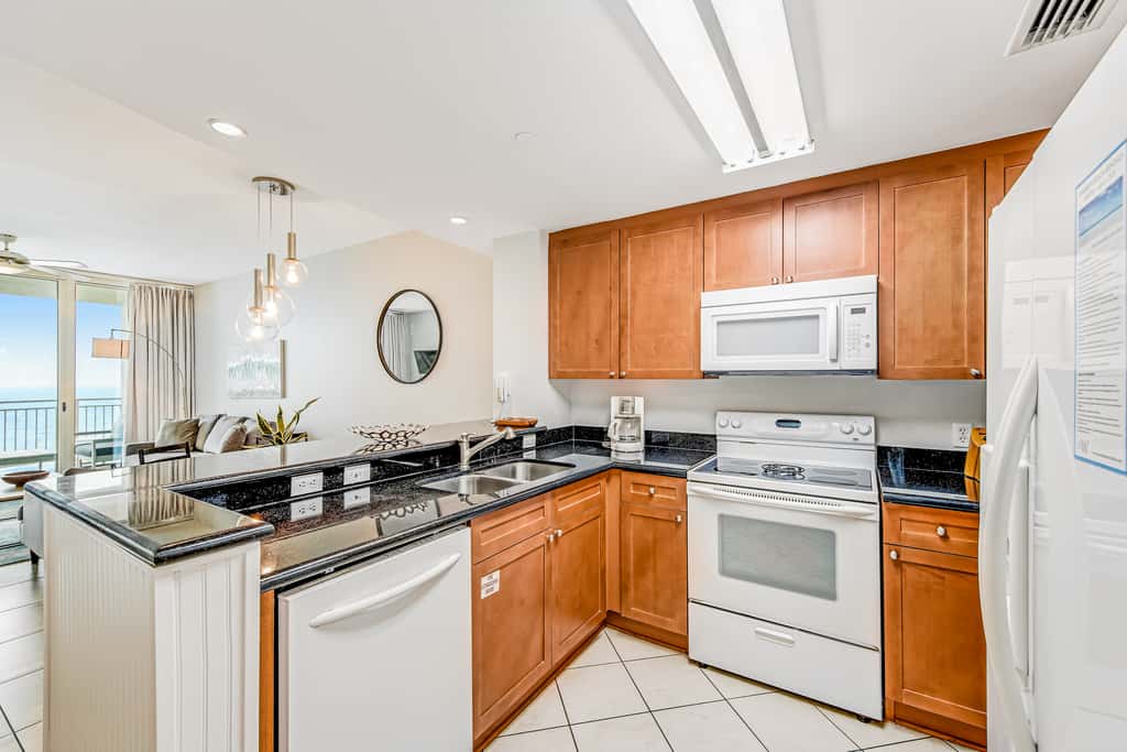 Renovated oceanfront condo with pools, hot tub & AC