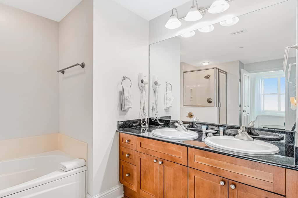 Renovated oceanfront condo with pools, hot tub & AC