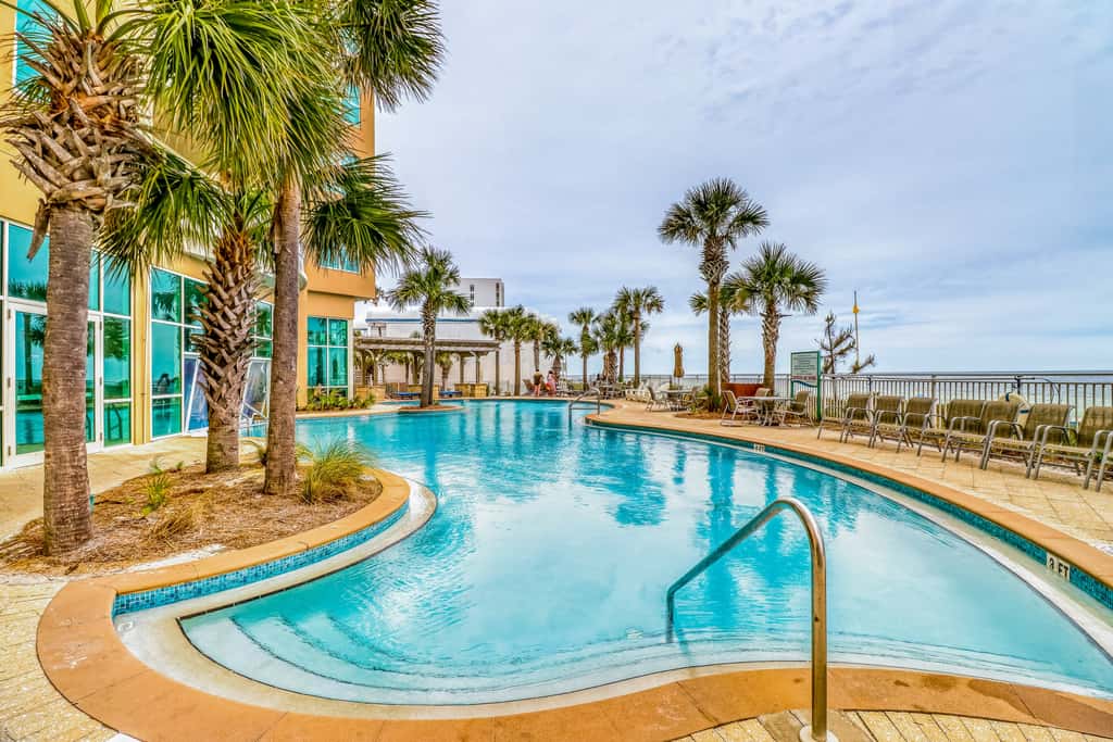 Updated, beachfront condo with pool, hot tub & gym