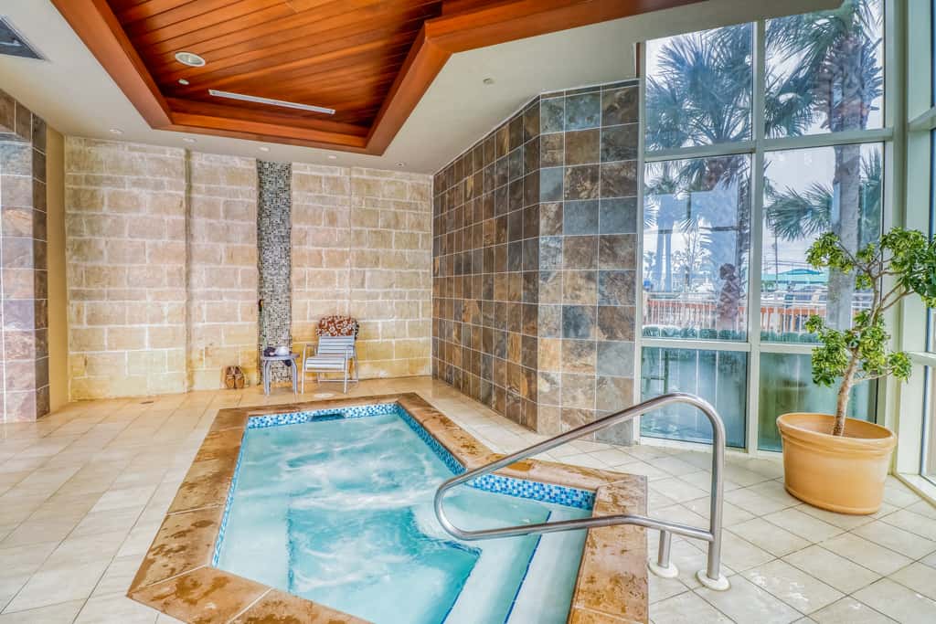 Updated, beachfront condo with pool, hot tub & gym