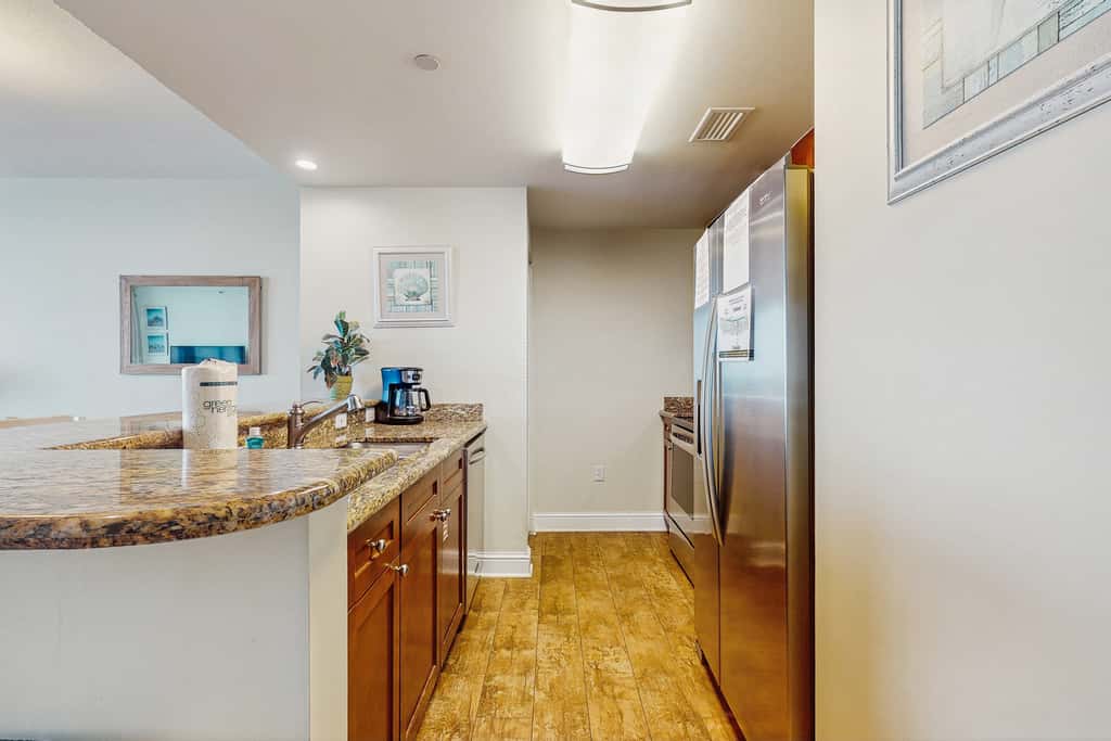 Updated, beachfront condo with pool, hot tub & gym