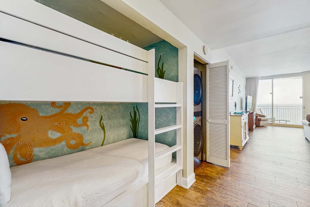 Updated, beachfront condo with pool, hot tub & gym