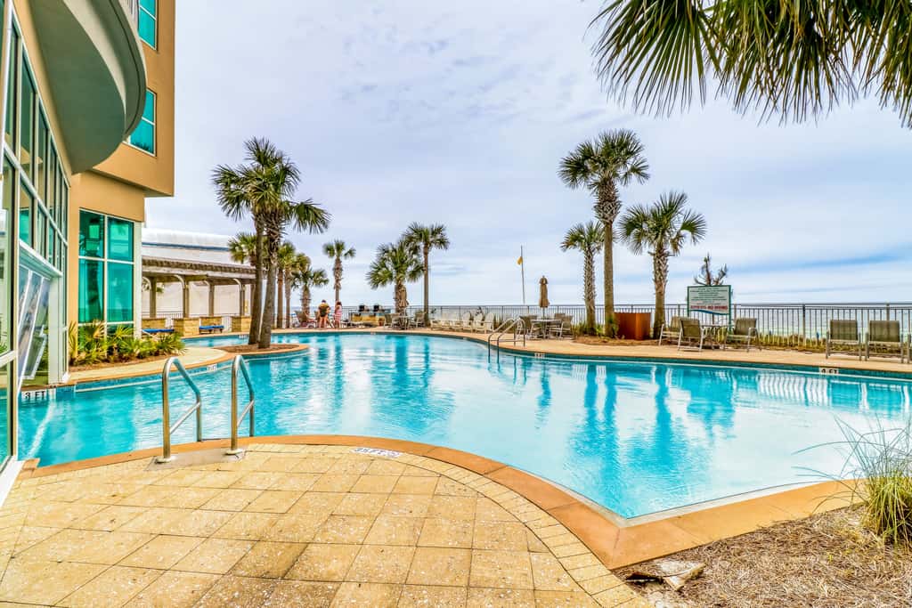 Updated, beachfront condo with pool, hot tub & gym