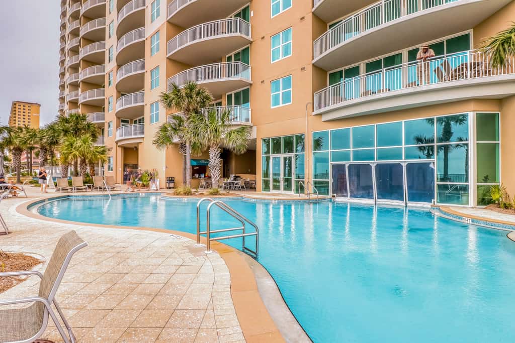 Updated, beachfront condo with pool, hot tub & gym