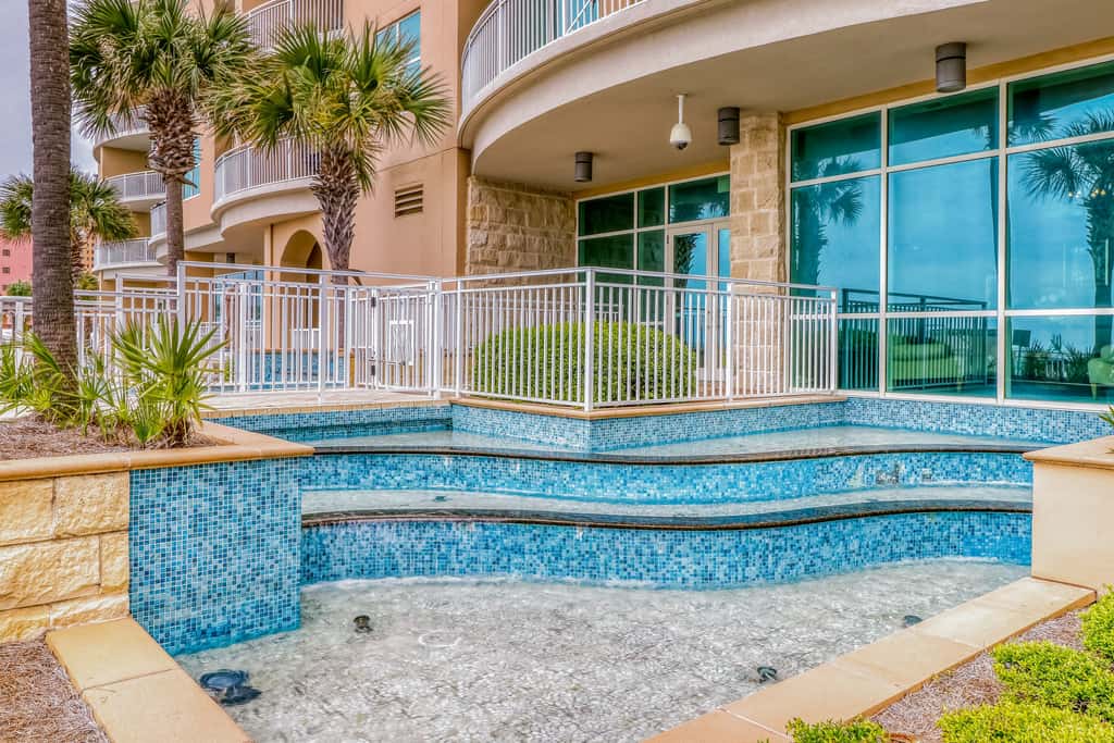 Updated, beachfront condo with pool, hot tub & gym