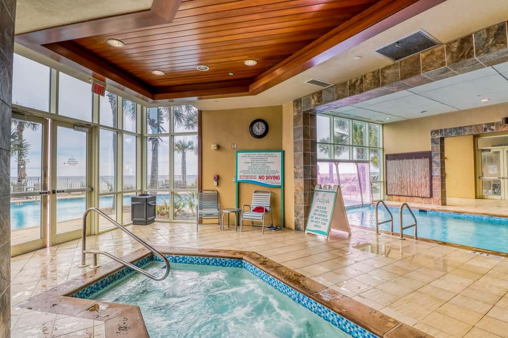 Updated, beachfront condo with pool, hot tub & gym