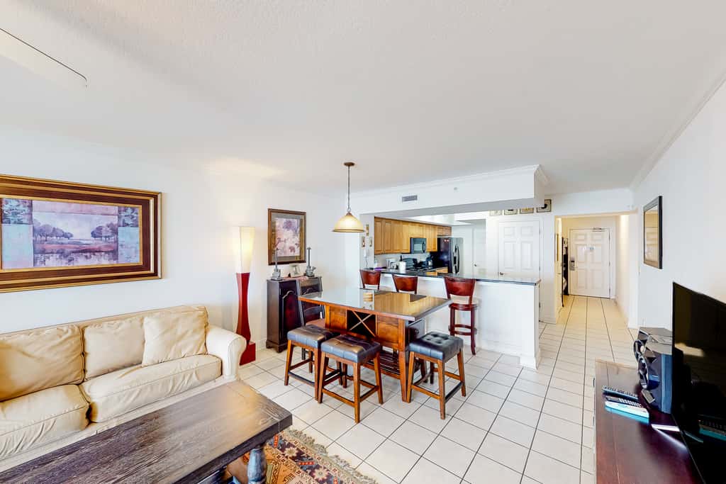 Beachfront condo with Gulf views, private balcony, pools, hot tub & beach access
