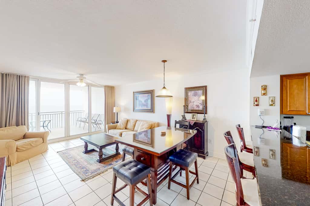 Beachfront condo with Gulf views, private balcony, pools, hot tub & beach access