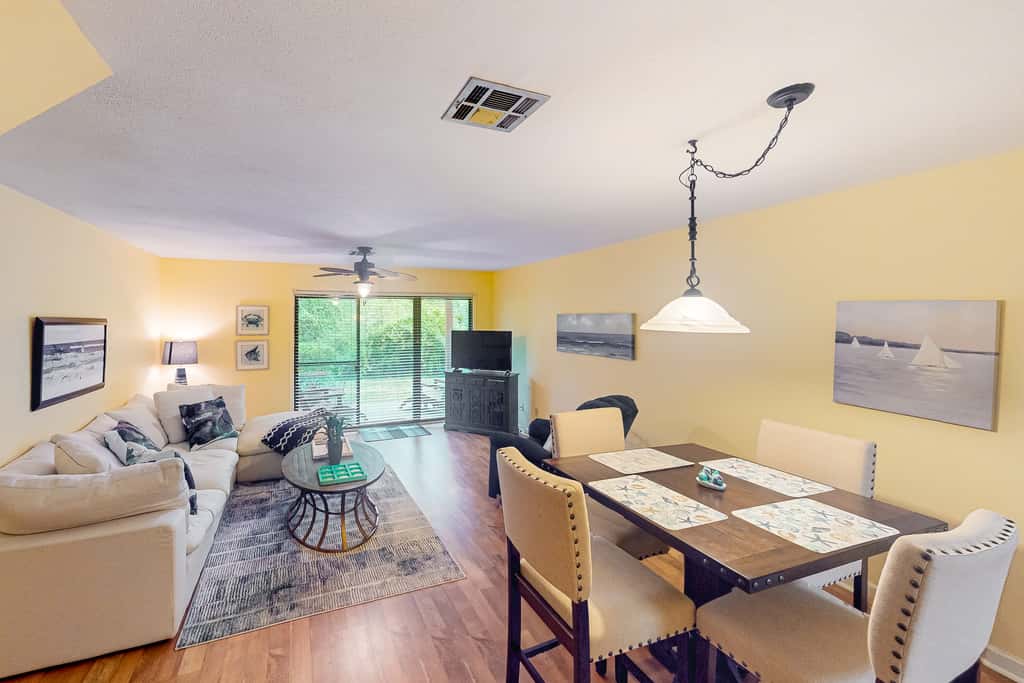 Sunny condo near the sand with pool, hot tub, tennis, smart TV, W&D, & AC