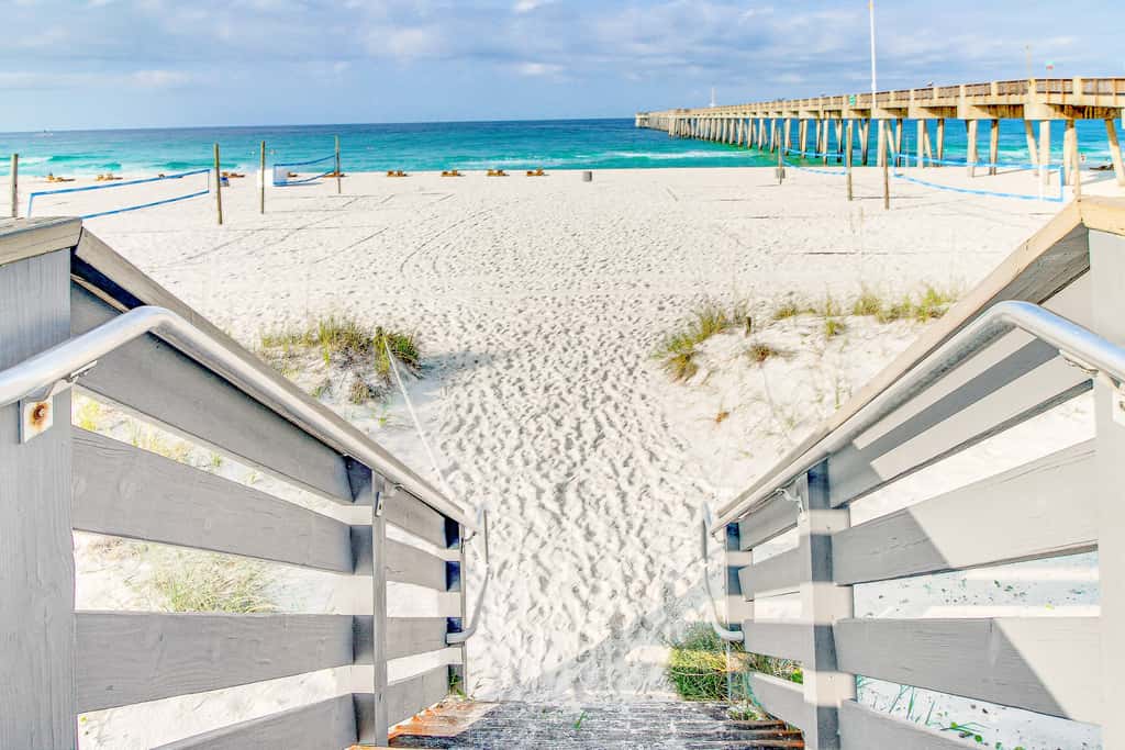 Sunny condo near the sand with pool, hot tub, tennis, smart TV, W&D, & AC