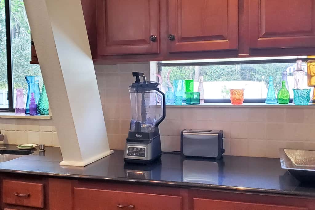 Updated dog-friendly home with private outdoor pool, patio, fireplace, W&D, AC