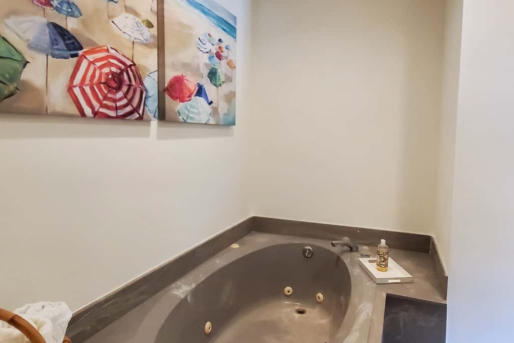 Updated dog-friendly home with private outdoor pool, patio, fireplace, W&D, AC