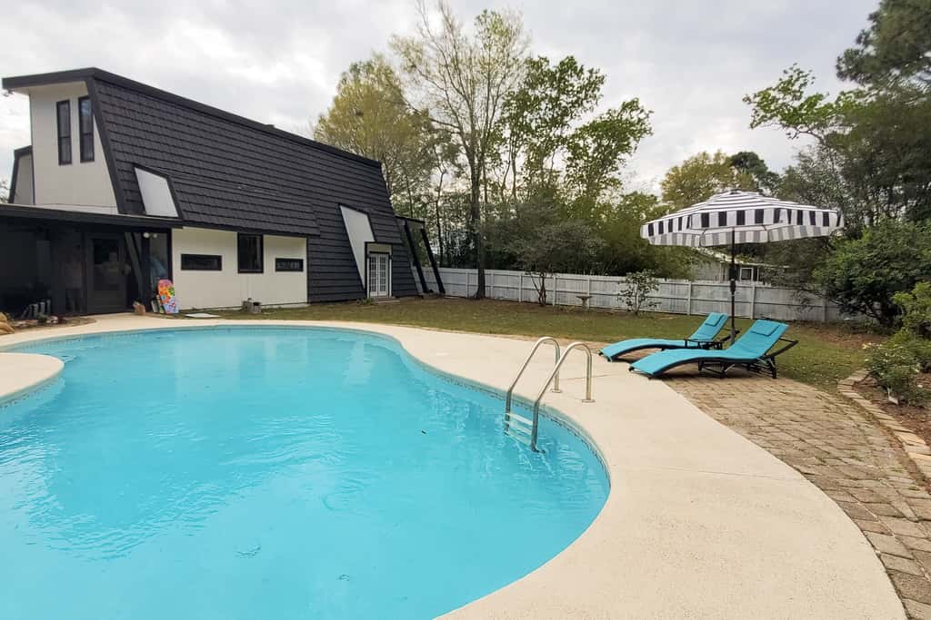 Updated dog-friendly home with private outdoor pool, patio, fireplace, W&D, AC