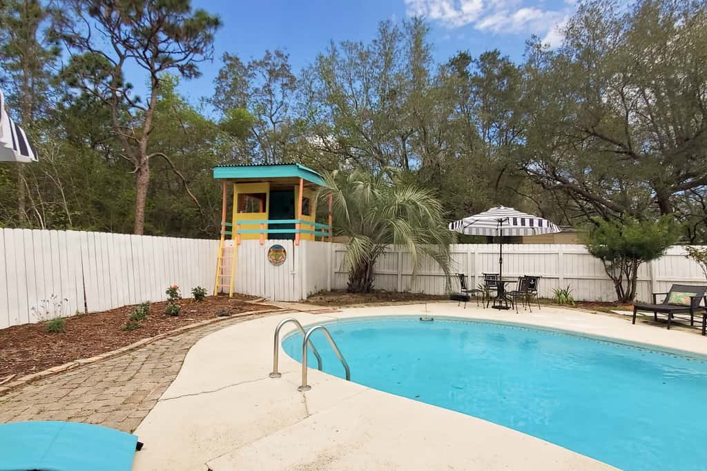 Updated dog-friendly home with private outdoor pool, patio, fireplace, W&D, AC