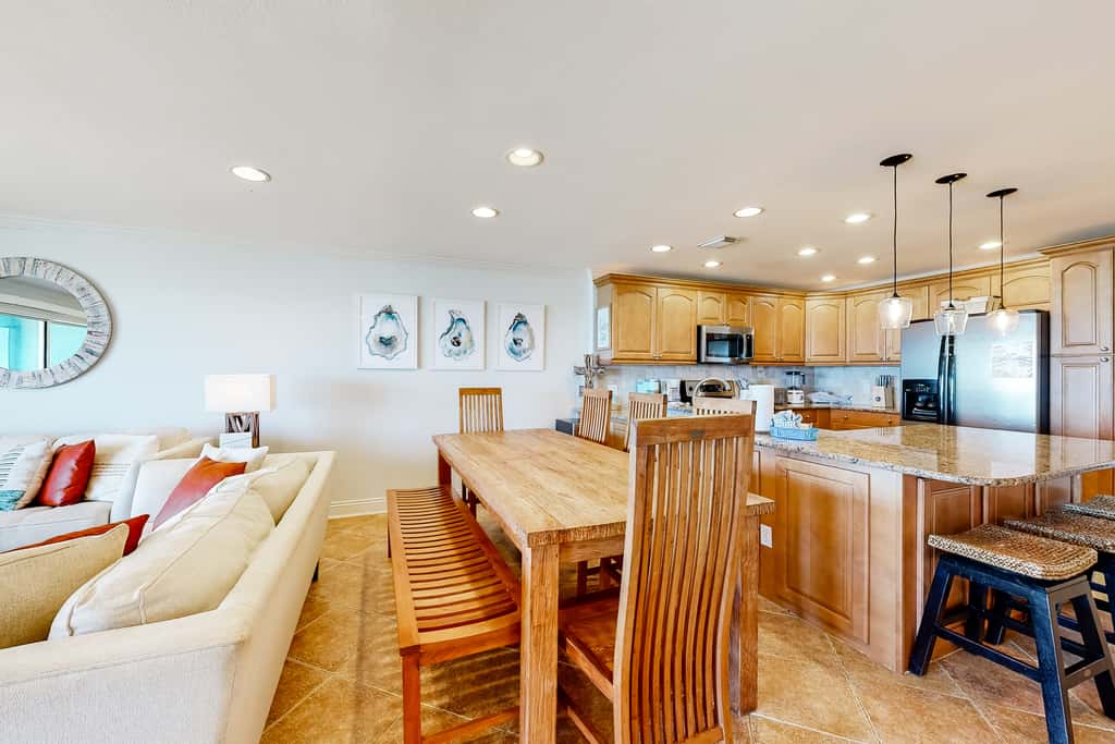 Three-Story Beachfront Gem with a Private Balcony, Ocean View, & Full Kitchen