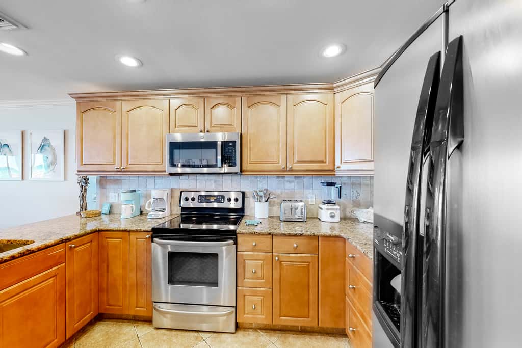 Three-Story Beachfront Gem with a Private Balcony, Ocean View, & Full Kitchen