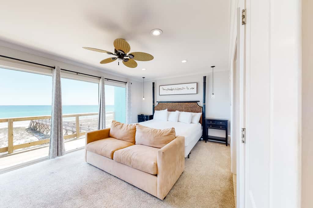 Three-Story Beachfront Gem with a Private Balcony, Ocean View, & Full Kitchen