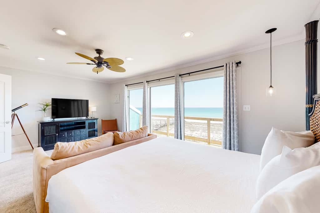 Three-Story Beachfront Gem with a Private Balcony, Ocean View, & Full Kitchen