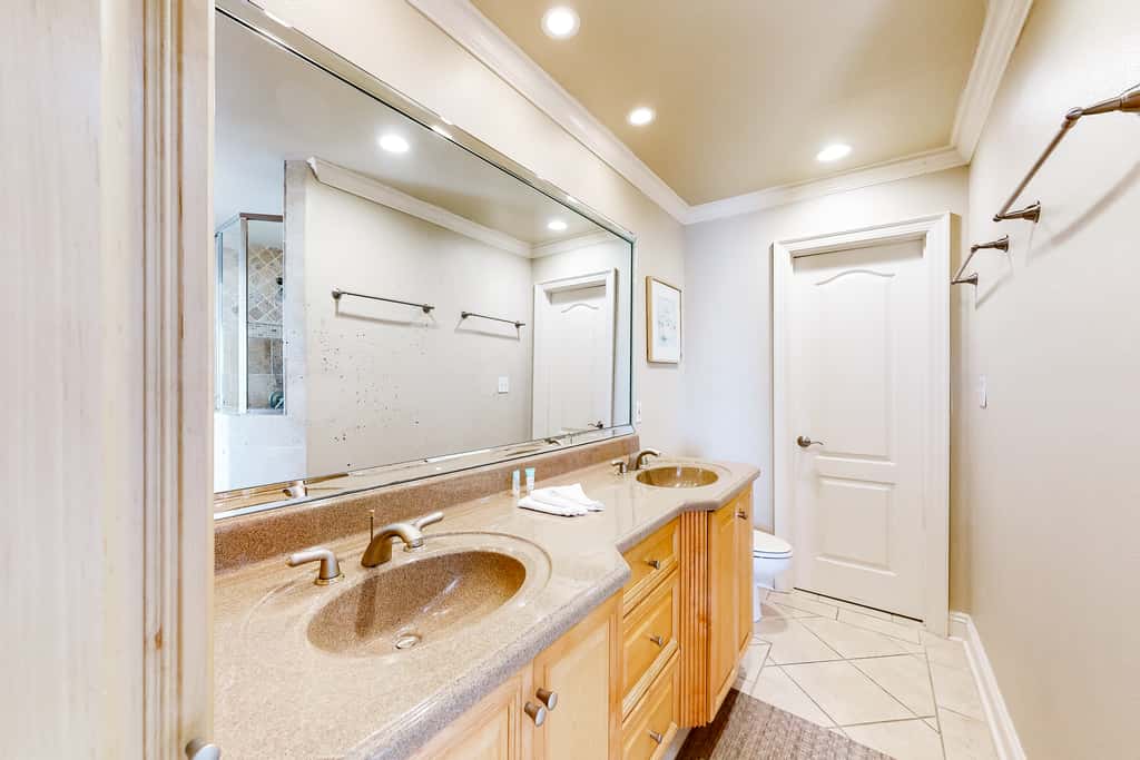 Three-Story Beachfront Gem with a Private Balcony, Ocean View, & Full Kitchen