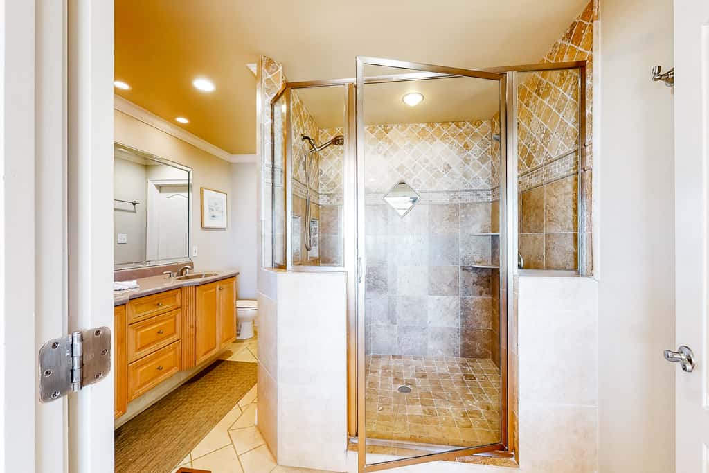 Three-Story Beachfront Gem with a Private Balcony, Ocean View, & Full Kitchen