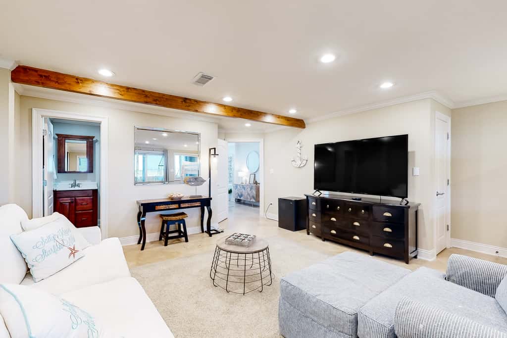 Three-Story Beachfront Gem with a Private Balcony, Ocean View, & Full Kitchen