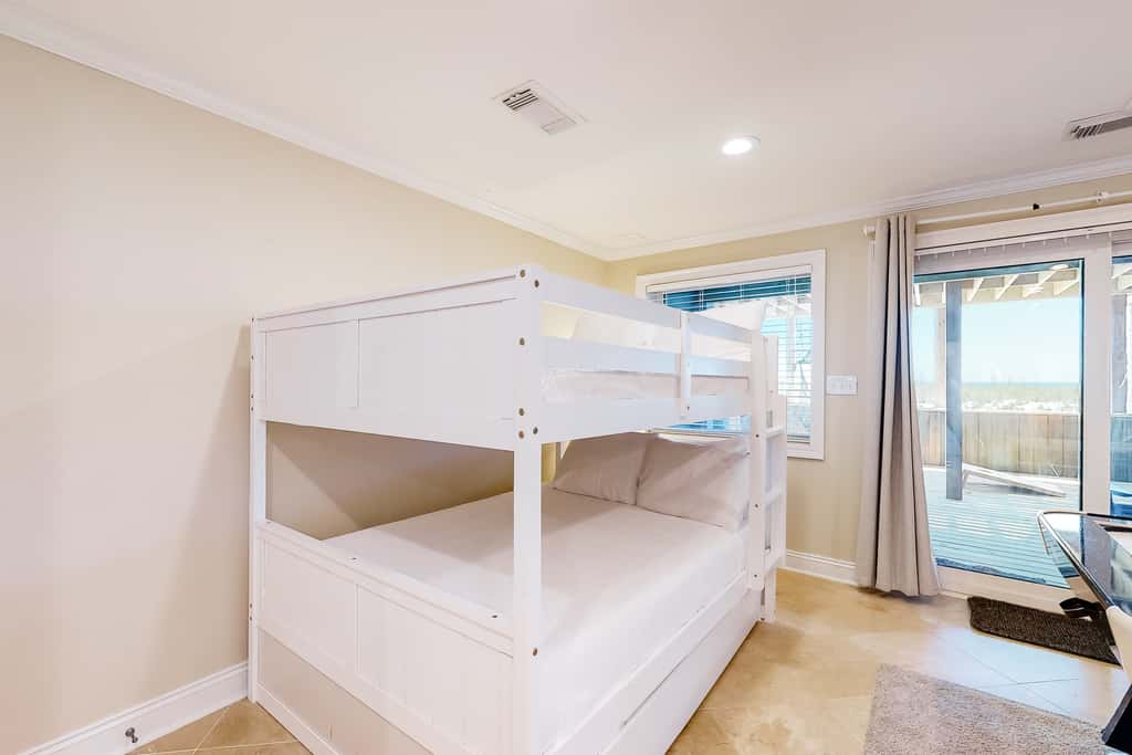 Three-Story Beachfront Gem with a Private Balcony, Ocean View, & Full Kitchen