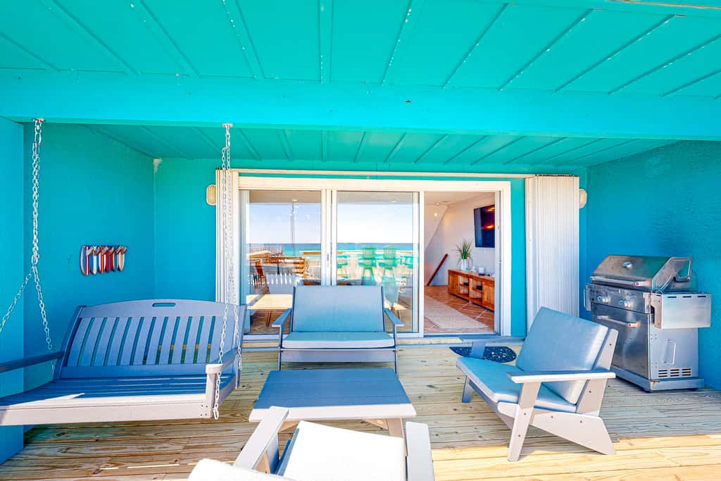 Three-Story Beachfront Gem with a Private Balcony, Ocean View, & Full Kitchen
