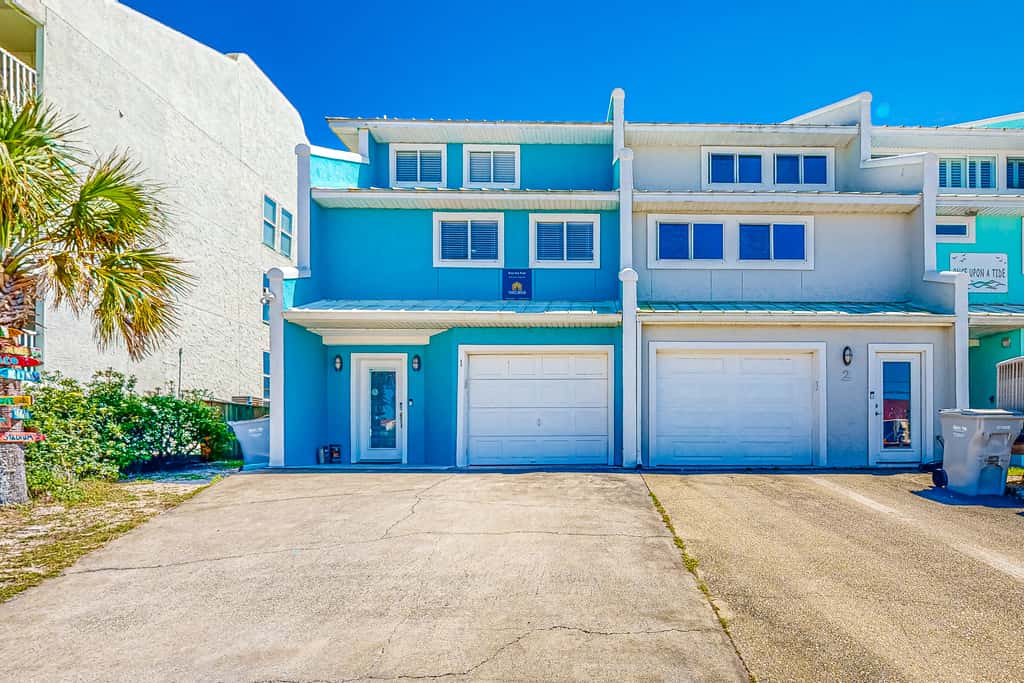 Three-Story Beachfront Gem with a Private Balcony, Ocean View, & Full Kitchen
