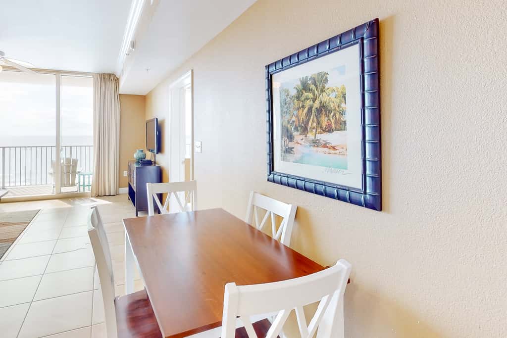 Picturesque beachfront condo with gym, BBQ area, pools & hot tub