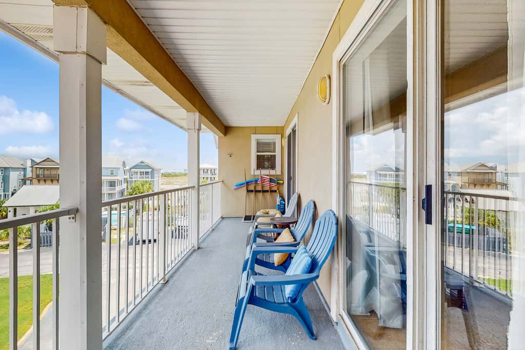 Beautiful condo with water-view, pool, balcony, central AC, & washer and dryer
