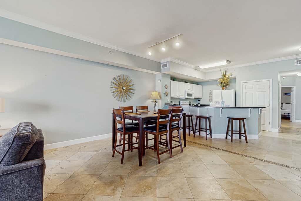 Escape to this waterfront condo with shared pools, a gym, & easy beach access