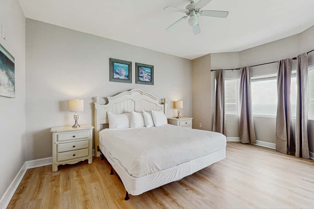 Escape to this waterfront condo with shared pools, a gym, & easy beach access