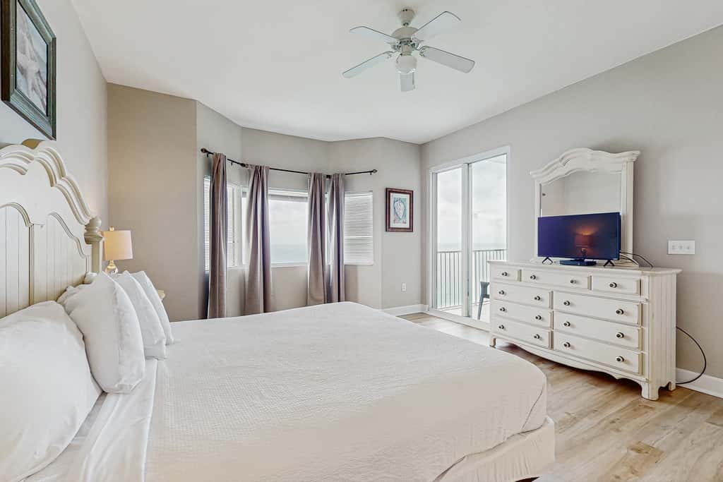 Escape to this waterfront condo with shared pools, a gym, & easy beach access