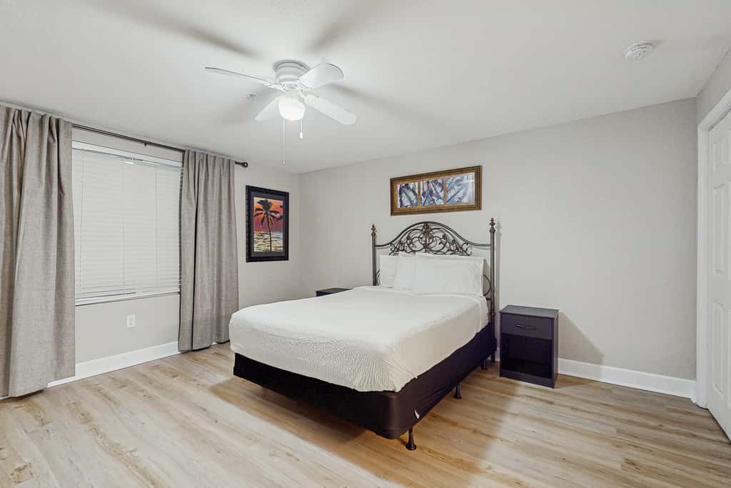 Escape to this waterfront condo with shared pools, a gym, & easy beach access
