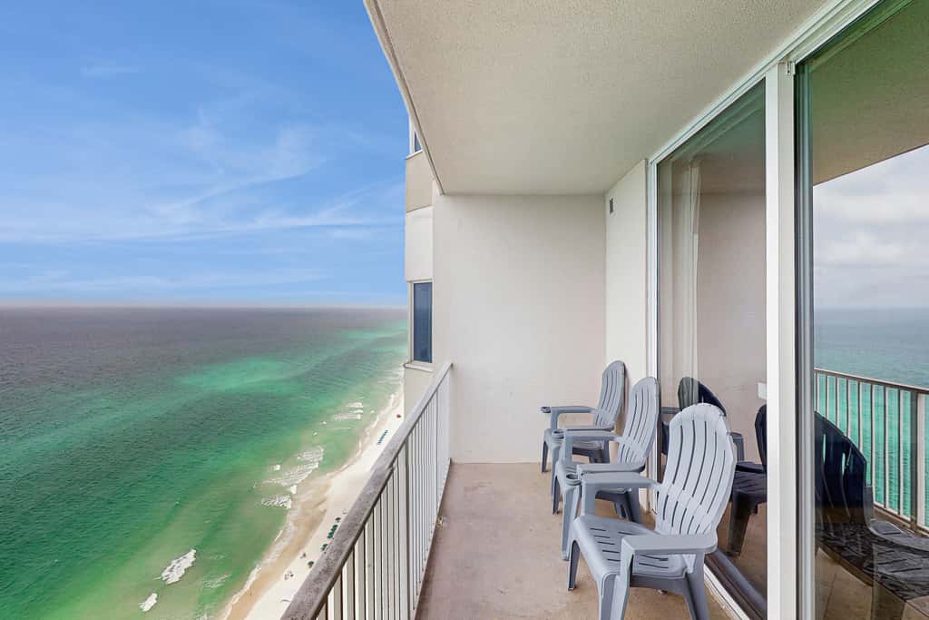 Escape to this waterfront condo with shared pools, a gym, & easy beach access