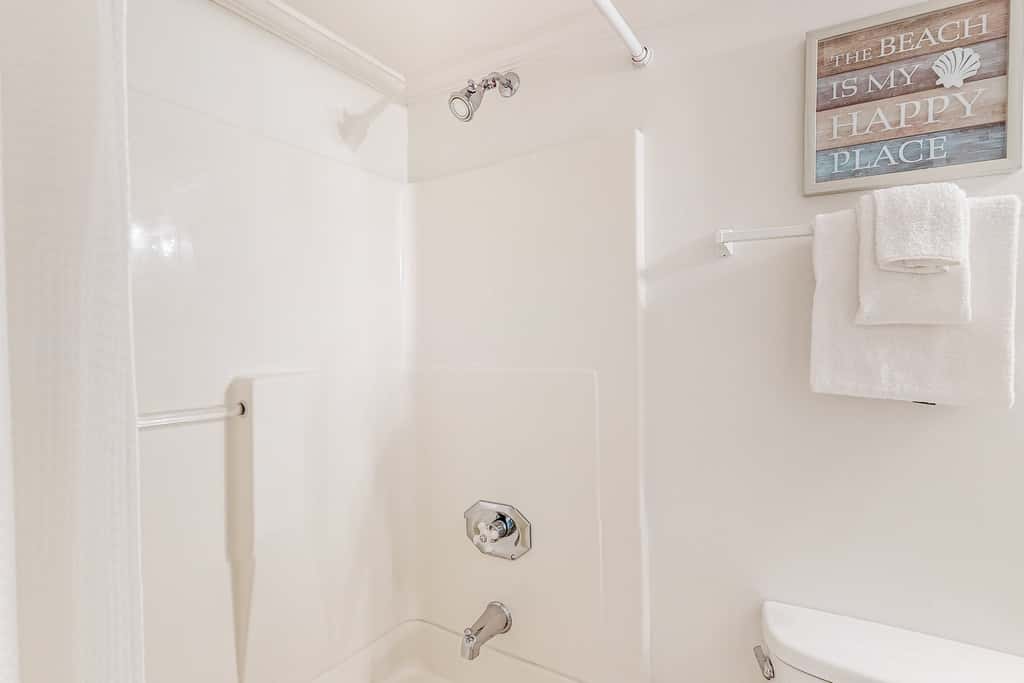 Beachfront resort condo with beach & lake access, pools, saunas & tennis