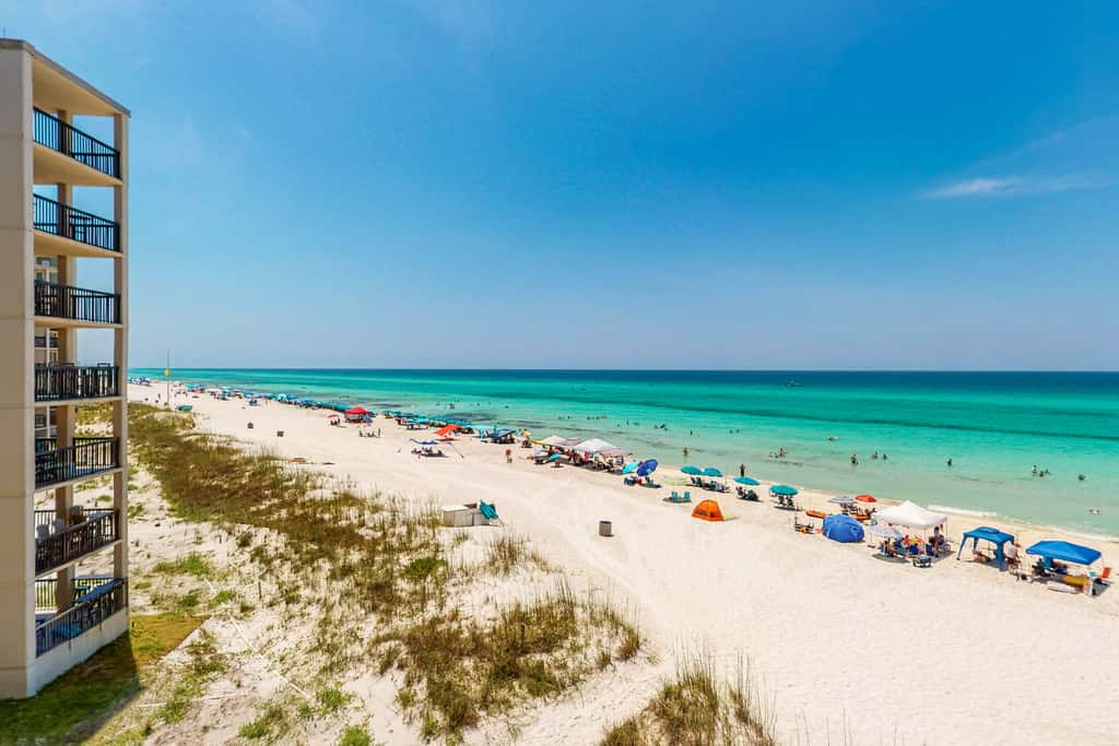 Beachfront resort condo with beach & lake access, pools, saunas & tennis