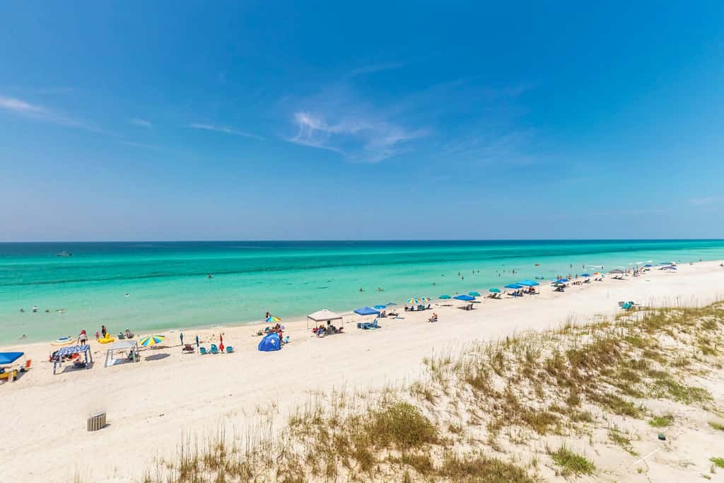 Beachfront resort condo with beach & lake access, pools, saunas & tennis
