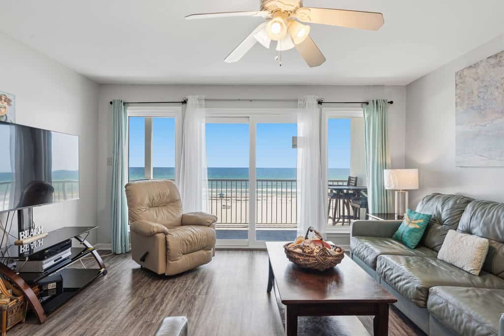 Bright Gulf-front condo with two balconies, pool, central AC, & WD
