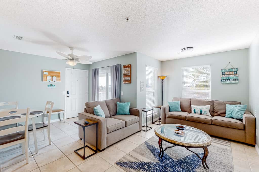 Sunny coastal condo with pool, balcony & sound view - walk to the beach