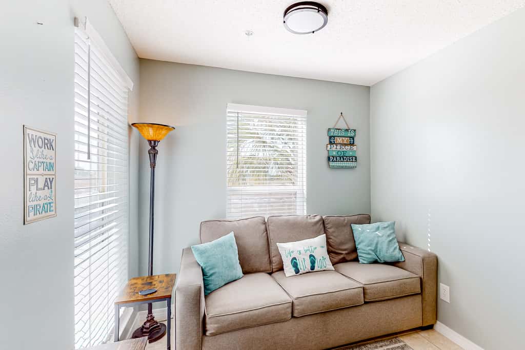 Sunny coastal condo with pool, balcony & sound view - walk to the beach