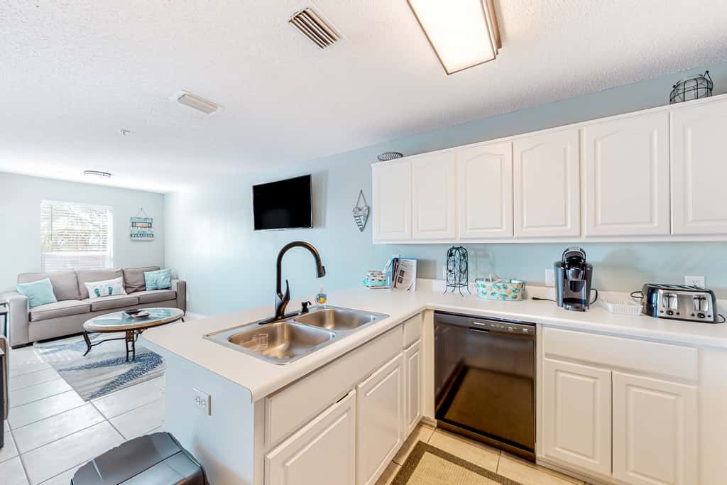 Sunny coastal condo with pool, balcony & sound view - walk to the beach