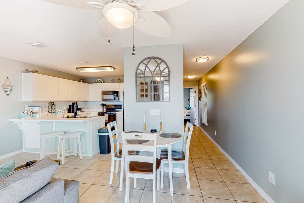 Sunny coastal condo with pool, balcony & sound view - walk to the beach