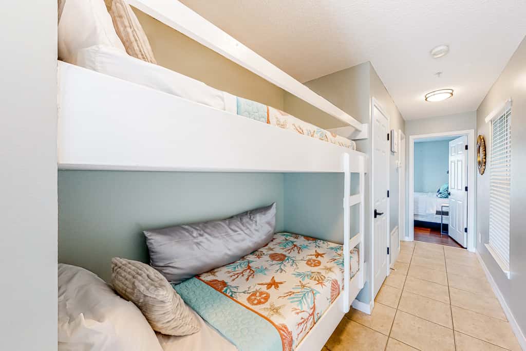 Sunny coastal condo with pool, balcony & sound view - walk to the beach