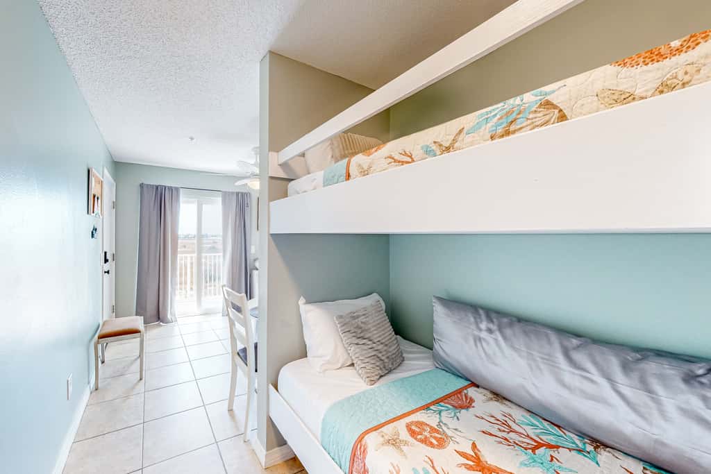 Sunny coastal condo with pool, balcony & sound view - walk to the beach