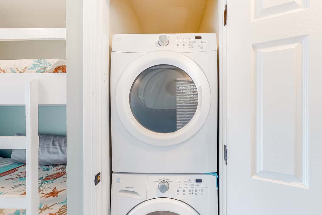 Sunny coastal condo with pool, balcony & sound view - walk to the beach
