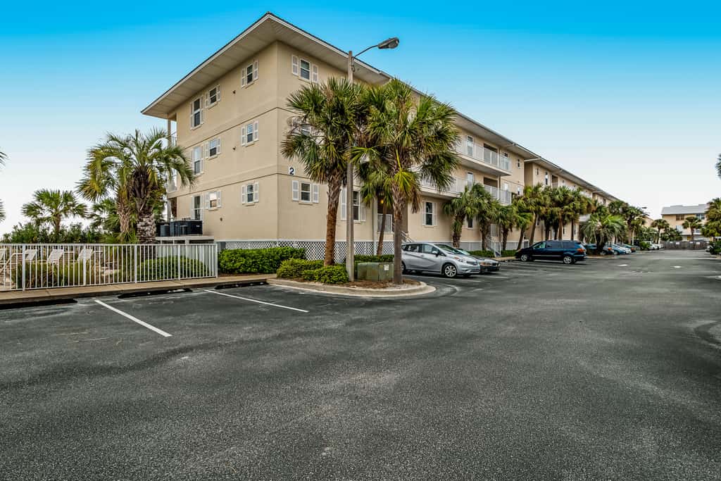 Sunny coastal condo with pool, balcony & sound view - walk to the beach