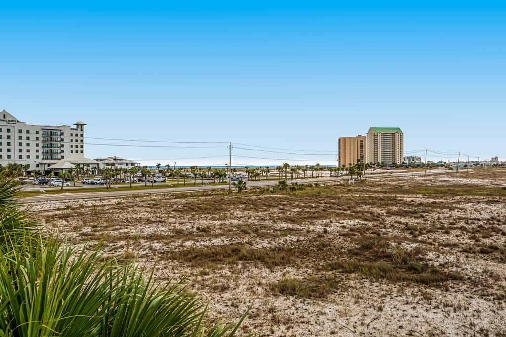 Sunny coastal condo with pool, balcony & sound view - walk to the beach