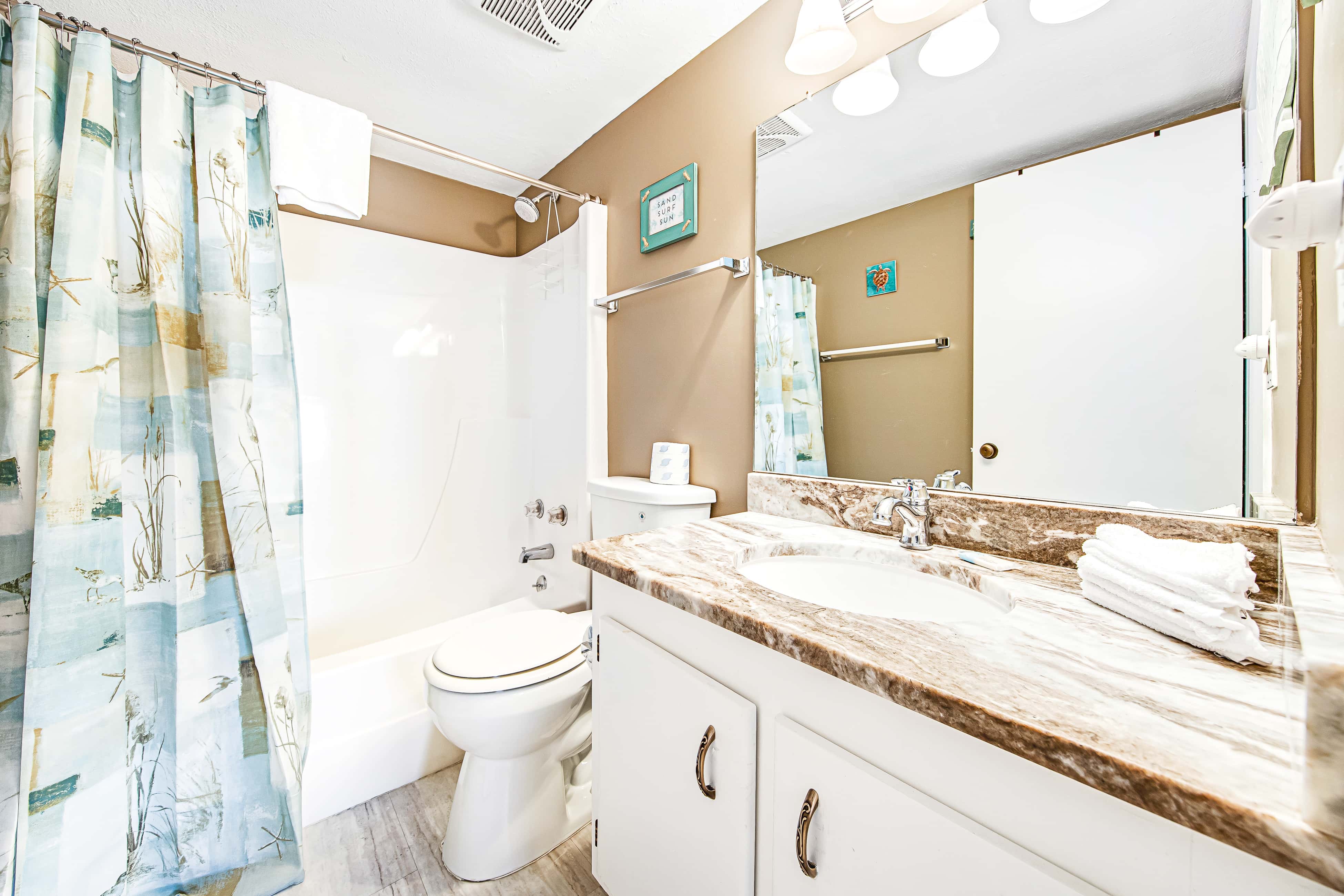 Heavenly retreat just steps from the beach with pools & tennis courts