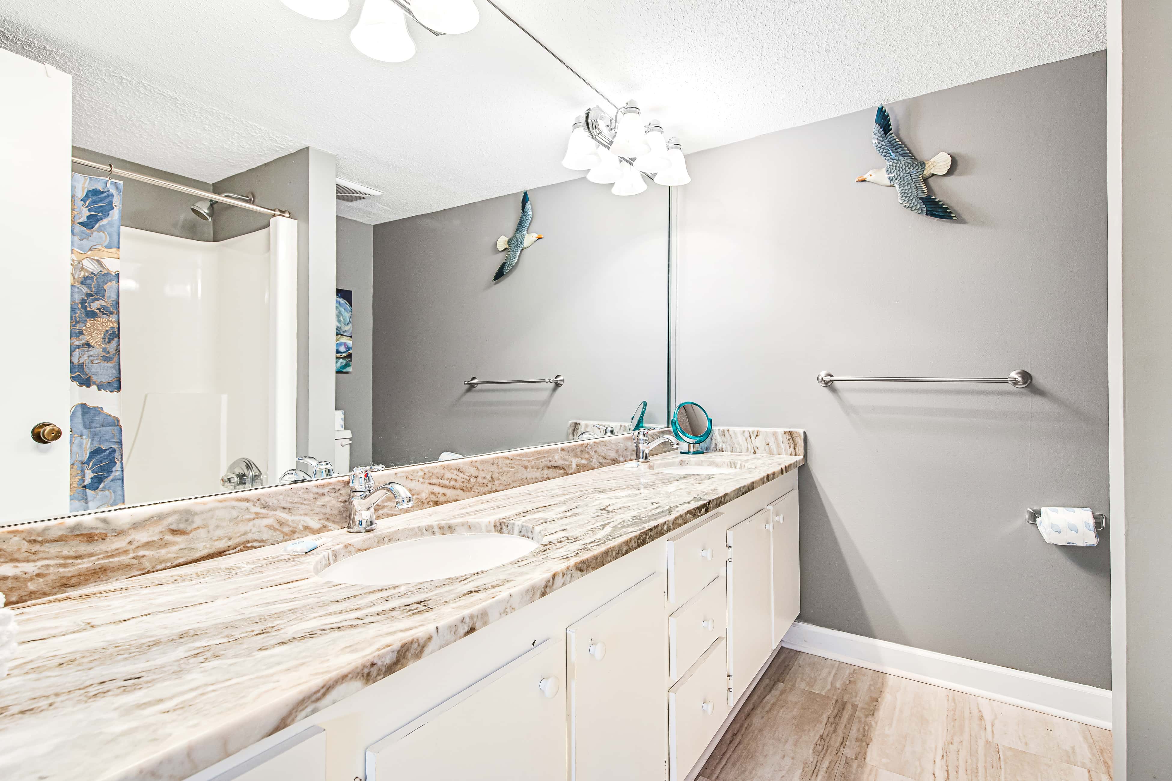 Heavenly retreat just steps from the beach with pools & tennis courts